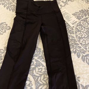 Lululemon fast free HR 25” tight,fast drying, sweat wicking black leggings size2